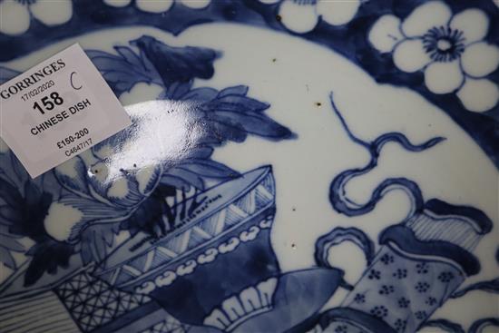 A large Chinese blue and white Antiques dish, 19th century, diameter 38cm
